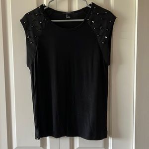 Black sleeveless top with silver spikes shoulder detail